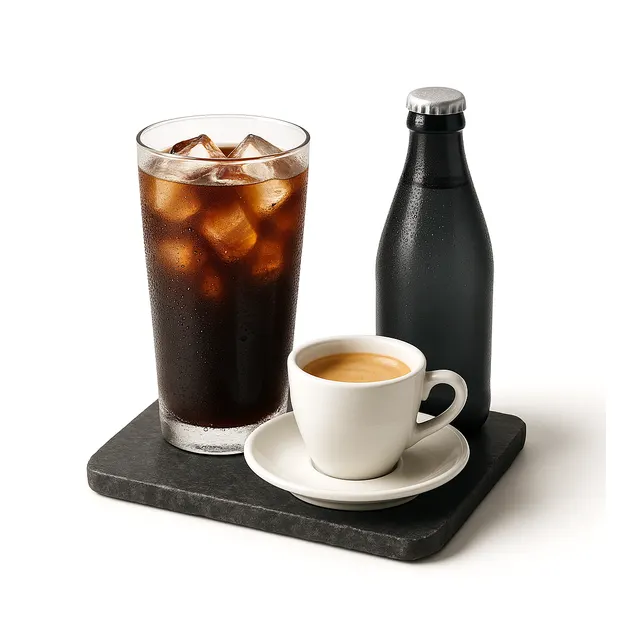 Iced coffee, an espresso cup and a bottle of sparkling water